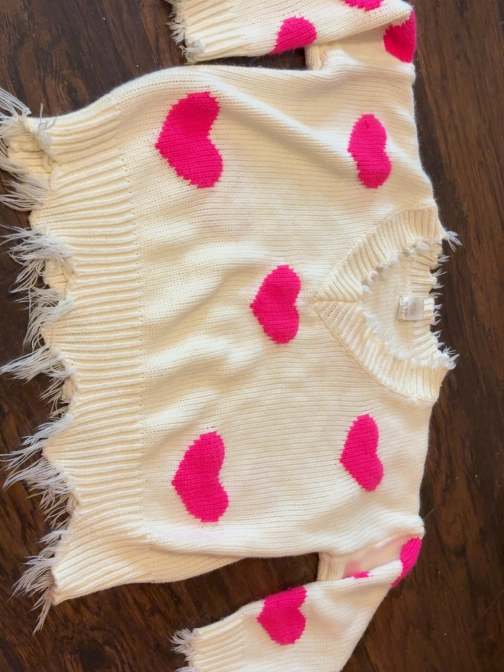 Cozy Distressed off white Sweater with Pink Heart Accents